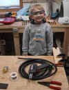 jamie helps daddy in the shop.jpg (102493 bytes)
